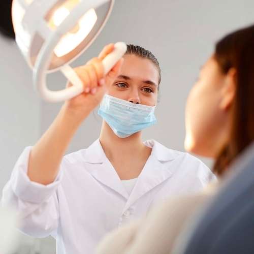 Dentist near me, dental treatment cost, nearby dental clinic, dentist treating patients